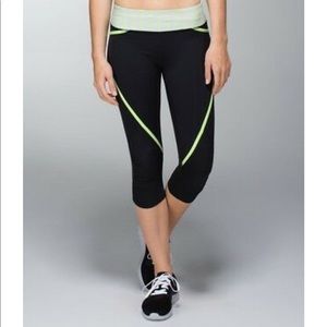 Black Lululemon crop leggings with fun accents